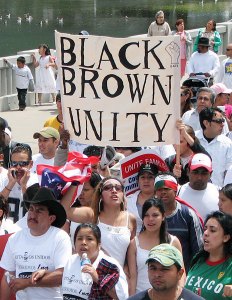 the "white" majority. [Who's holding that sign?]